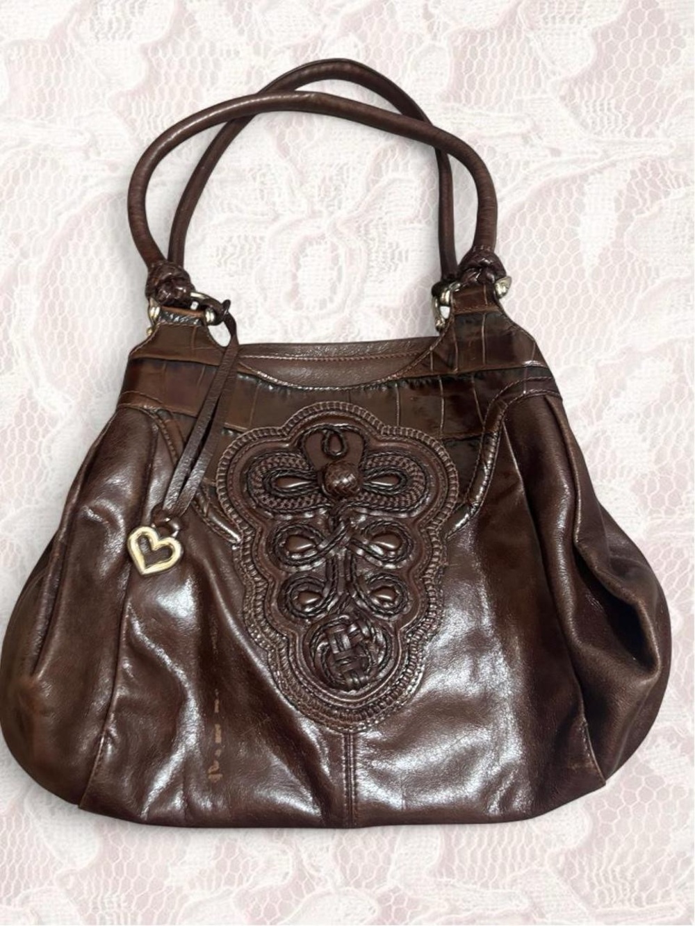 Brown leather Brighton handbag with embossed floral design
